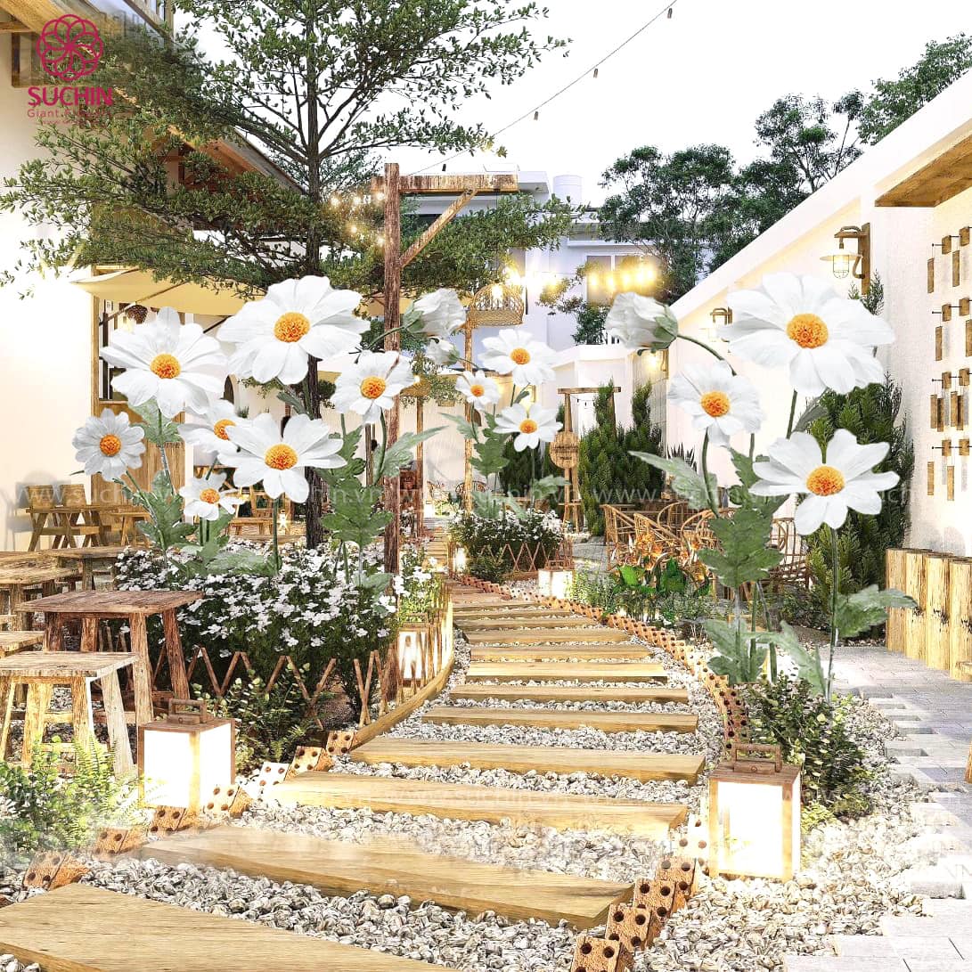 Trang trí quán cafe bằng hoa khổng lồ
